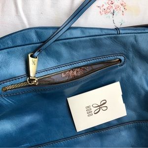 Hobo leather convertible backpack + shoulder bag
teal blue leather